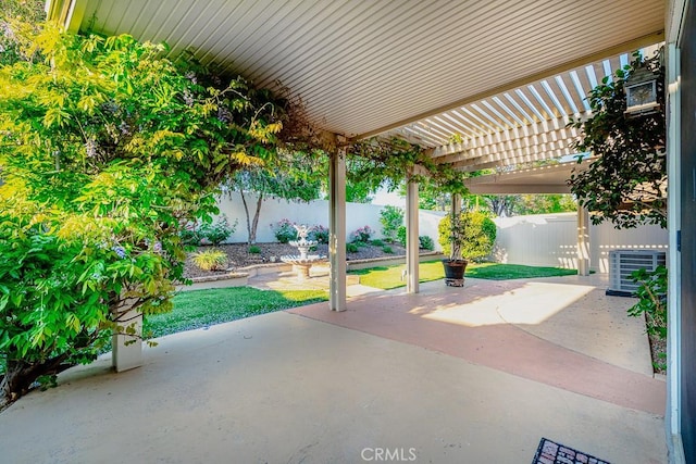 view of patio / terrace featuring a pergola, a fenced backyard, and central AC unit