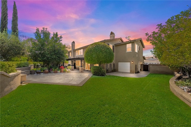 33931 Baystone St, Temecula, CA 92592 - rear view of property with a patio area, stucco siding, a garage, and a chimney
