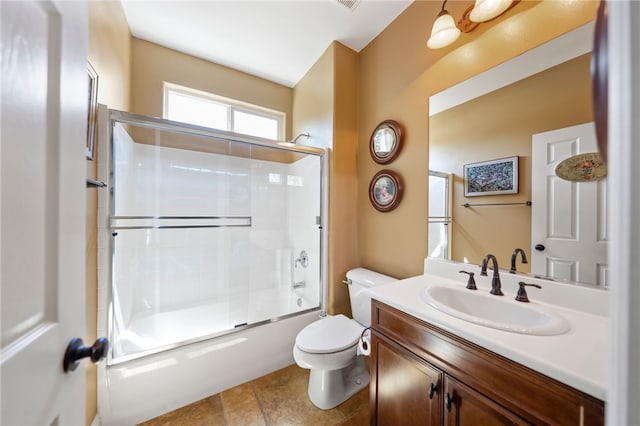 33931 Baystone St, Temecula, CA 92592 - bathroom featuring toilet, combined bath / shower with glass door, vanity, and tile patterned floors