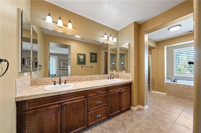 33931 Baystone St, Temecula, CA 92592 - bathroom featuring double vanity, a garden tub, tile patterned floors, and baseboards