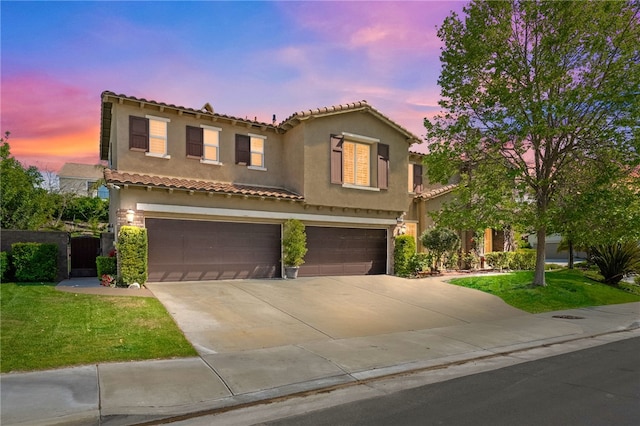33931 Baystone St, Temecula, CA 92592 - mediterranean / spanish-style home with an attached garage, stucco siding, driveway, a tiled roof, and a front yard