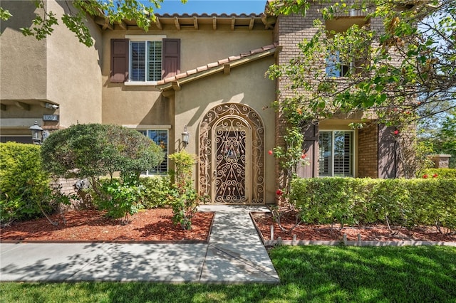 33931 Baystone St, Temecula, CA 92592 - view of front of property featuring stucco siding and brick siding