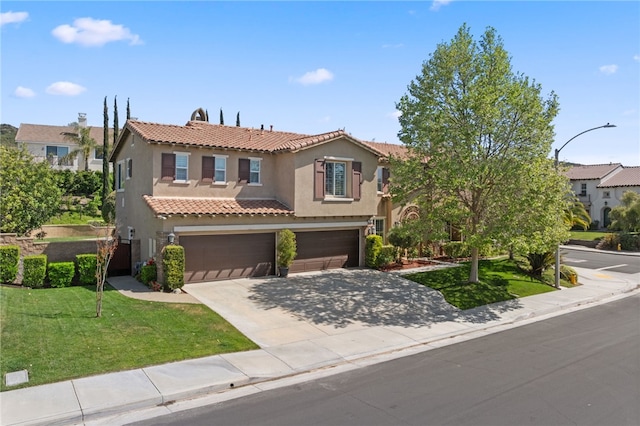 33931 Baystone St, Temecula, CA 92592 - view of front of home with stucco siding, a tiled roof, an attached garage, a front lawn, and concrete driveway