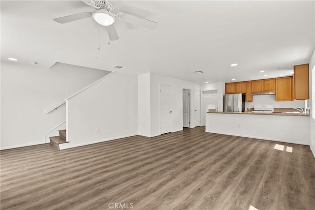 26145 Gravett Pl, Saugus, CA 91350 - unfurnished living room featuring recessed lighting, wood finished floors, baseboards, stairway, and a ceiling fan