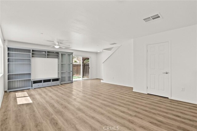 26145 Gravett Pl, Saugus, CA 91350 - unfurnished living room with baseboards, visible vents, wood finished floors, and ceiling fan