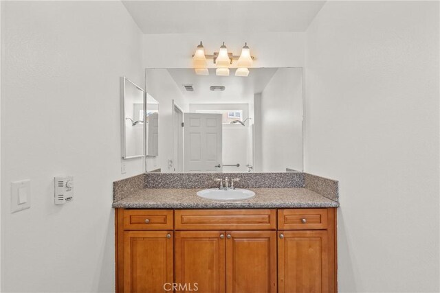 26145 Gravett Pl, Saugus, CA 91350 - bathroom featuring visible vents and vanity