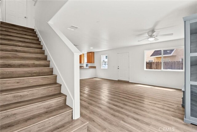 26145 Gravett Pl, Saugus, CA 91350 - entryway with stairway, wood finished floors, a ceiling fan, and recessed lighting