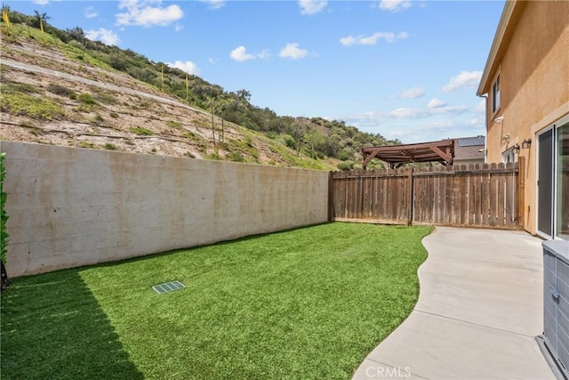 26145 Gravett Pl, Saugus, CA 91350 - view of yard with visible vents, a patio area, and a fenced backyard