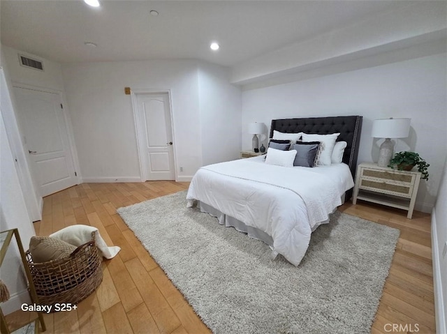412 Arenoso Ln Unit 102, San Clemente, CA 92672 - bedroom featuring light wood-style flooring, recessed lighting, and baseboards