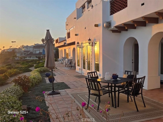 412 Arenoso Ln Unit 102, San Clemente, CA 92672 - view of patio featuring outdoor dining area and french doors