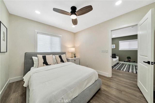bedroom with baseboards, a ceiling fan, recessed lighting, and wood finished floors