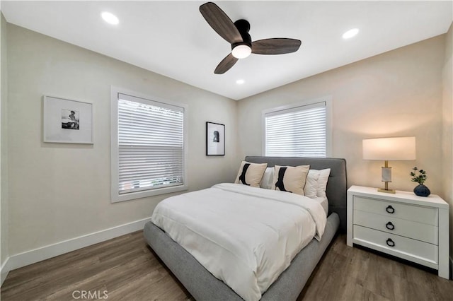 bedroom featuring recessed lighting, baseboards, dark wood-style floors, and ceiling fan