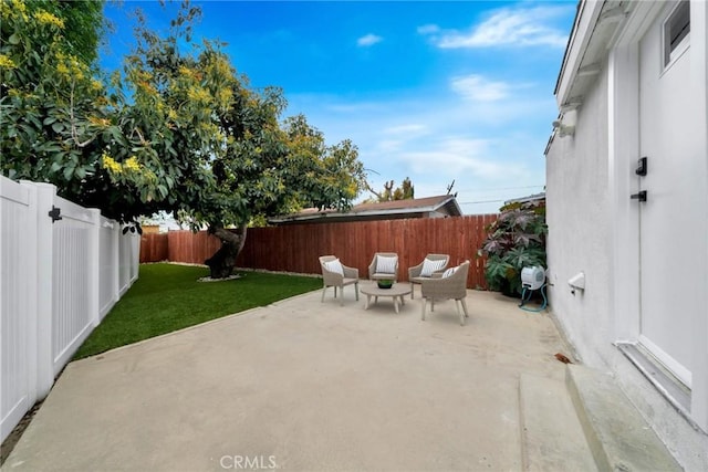 view of patio featuring a fenced backyard