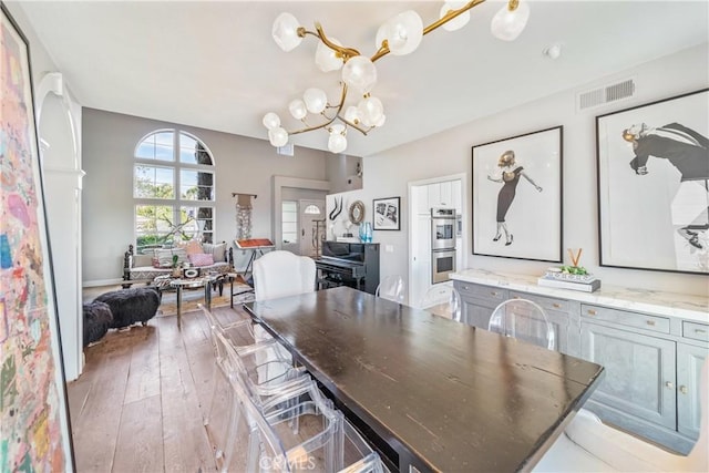 2009 Via Aguila, San Clemente, CA 92673 - dining room with a chandelier and light wood-style floors