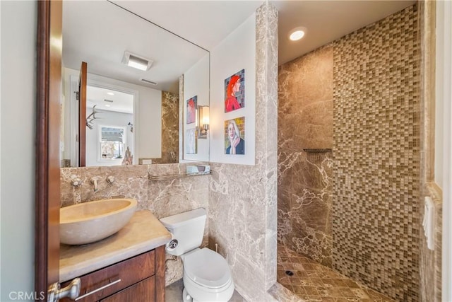 2009 Via Aguila, San Clemente, CA 92673 - full bathroom featuring vanity, tiled shower, and tile walls