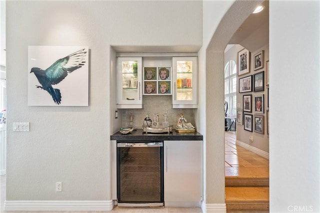 2009 Via Aguila, San Clemente, CA 92673 - indoor dry bar featuring wine cooler, arched walkways, and decorative backsplash
