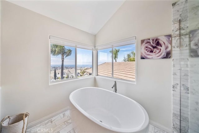 2009 Via Aguila, San Clemente, CA 92673 - full bath with marble look tile flooring, a freestanding tub, a stall shower, and lofted ceiling