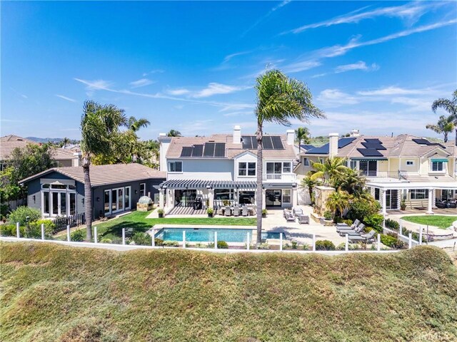 2009 Via Aguila, San Clemente, CA 92673 - back of house with a pergola, an outdoor pool, a residential view, a fenced backyard, and a patio area