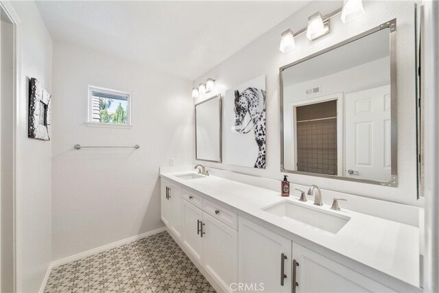 2009 Via Aguila, San Clemente, CA 92673 - bathroom featuring tile patterned floors, double vanity, and a shower