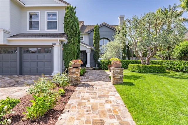 2009 Via Aguila, San Clemente, CA 92673 - view of front of property featuring a garage, a front yard, and decorative driveway