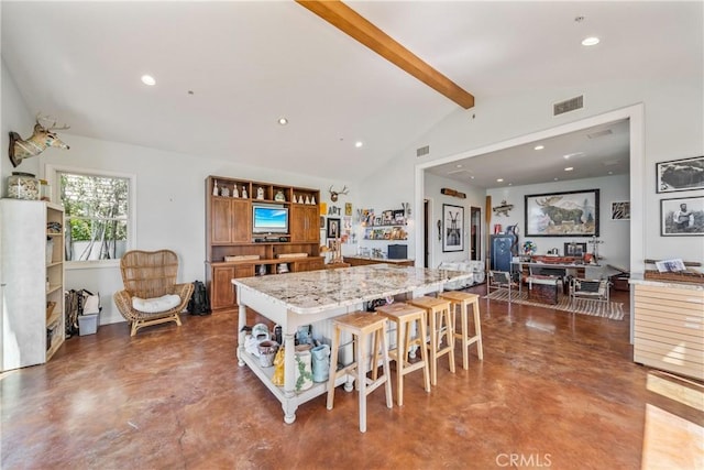 2009 Via Aguila, San Clemente, CA 92673 - kitchen featuring open shelves, concrete flooring, a breakfast bar area, brown cabinets, and light stone counters
