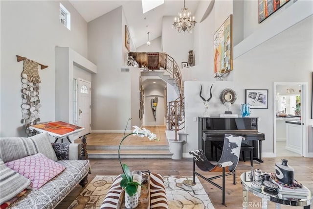 2009 Via Aguila, San Clemente, CA 92673 - living area featuring high vaulted ceiling, wood finished floors, and a chandelier