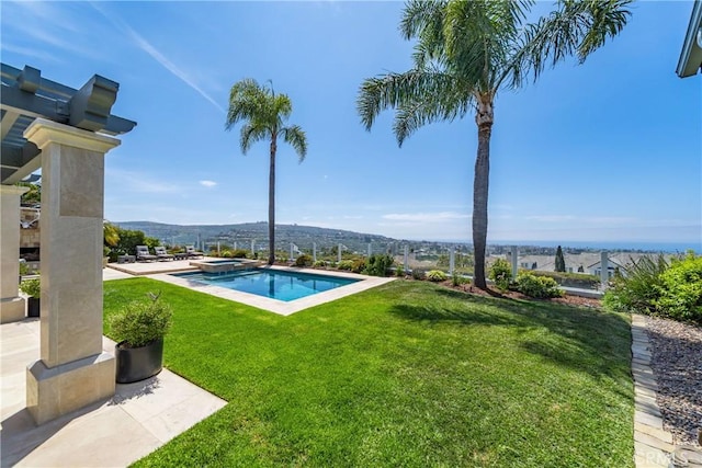 2009 Via Aguila, San Clemente, CA 92673 - view of pool with a yard, a pool with connected hot tub, and a mountain view