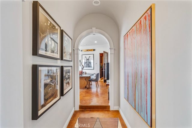 2009 Via Aguila, San Clemente, CA 92673 - corridor featuring arched walkways, light wood finished floors, and vaulted ceiling