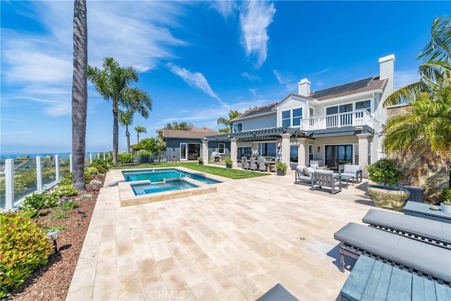 2009 Via Aguila, San Clemente, CA 92673 - view of pool featuring a patio, a pool with connected hot tub, an outdoor hangout area, and outdoor dining area