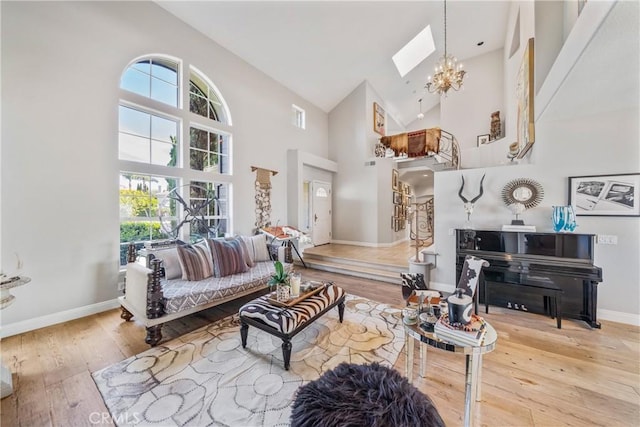 2009 Via Aguila, San Clemente, CA 92673 - living area featuring a skylight, hardwood / wood-style floors, and high vaulted ceiling