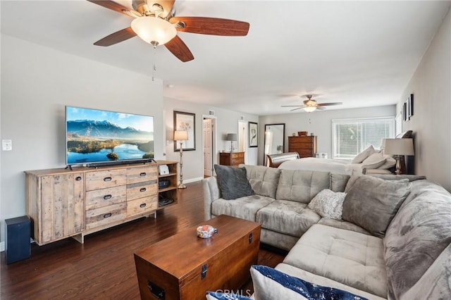10313 Christine Pl, Chatsworth, CA 91311 - living area featuring a ceiling fan, dark wood-type flooring, and baseboards