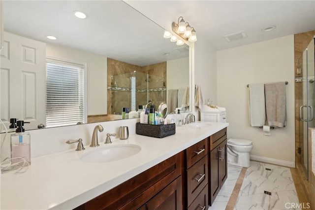 10313 Christine Pl, Chatsworth, CA 91311 - full bath featuring a shower stall, double vanity, marble finish flooring, baseboards, and recessed lighting