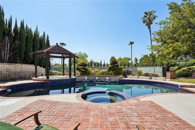 10313 Christine Pl, Chatsworth, CA 91311 - view of swimming pool featuring a gazebo, a pool with connected hot tub, and a fenced backyard