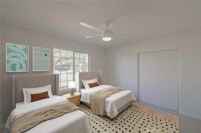 bedroom featuring a textured ceiling, ceiling fan, and a closet