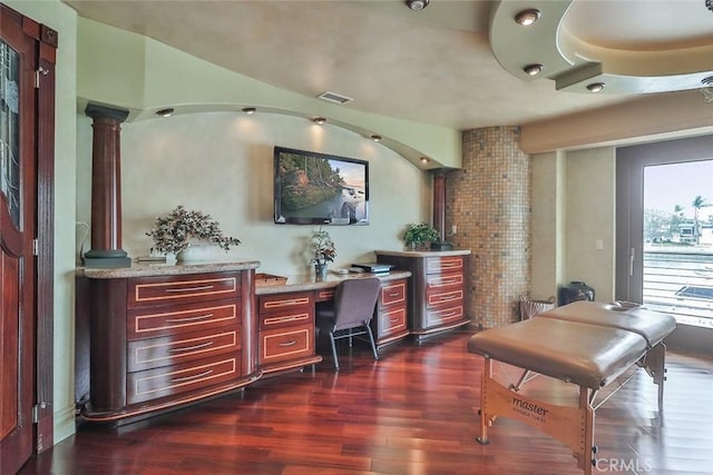 5455 E Sorrento Dr, Long Beach, CA 90803 - office space featuring ornate columns, visible vents, built in study area, and dark wood-type flooring