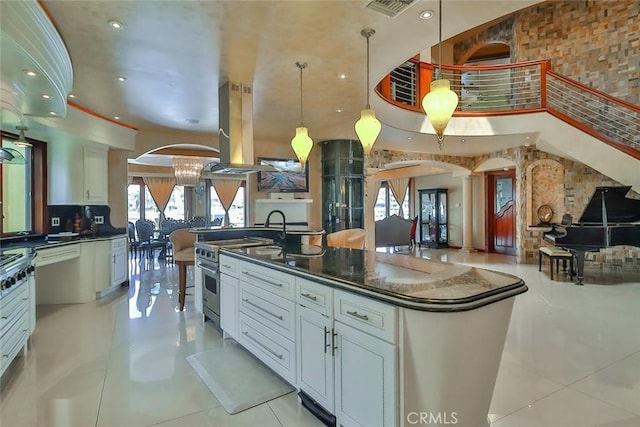 5455 E Sorrento Dr, Long Beach, CA 90803 - kitchen featuring dark countertops, island exhaust hood, visible vents, high end stainless steel range oven, and light tile patterned flooring