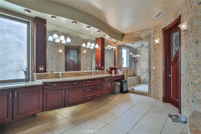 5455 E Sorrento Dr, Long Beach, CA 90803 - full bathroom with tile patterned floors, a shower stall, double vanity, a sink, and visible vents
