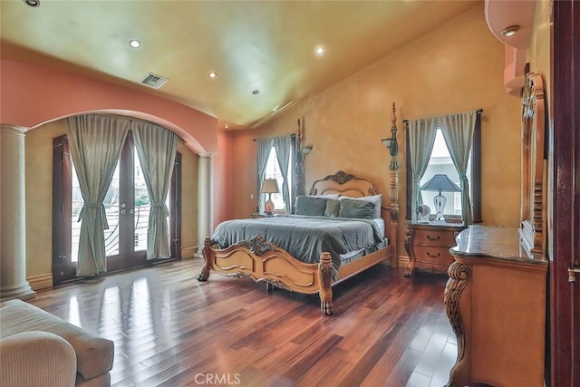 5455 E Sorrento Dr, Long Beach, CA 90803 - bedroom featuring decorative columns, recessed lighting, dark wood-type flooring, and vaulted ceiling