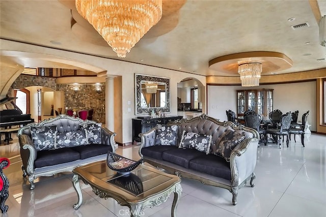 5455 E Sorrento Dr, Long Beach, CA 90803 - tiled living room featuring a chandelier, a raised ceiling, visible vents, ornate columns, and arched walkways