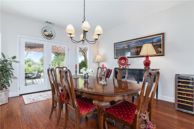 1835 Rancho Lomas Way, San Miguel, CA 93451 - dining space featuring beverage cooler, wood finished floors, a chandelier, french doors, and baseboards