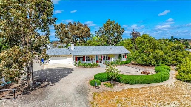 1835 Rancho Lomas Way, San Miguel, CA 93451 - ranch-style house with covered porch, an attached garage, driveway, and a chimney