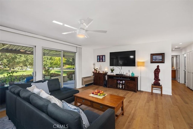 5472 Paseo Del Lago E Unit B, Laguna Woods, CA 92637 - living area with a ceiling fan and light wood finished floors