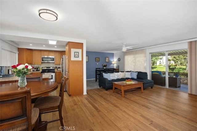 5472 Paseo Del Lago E Unit B, Laguna Woods, CA 92637 - living area with light wood-type flooring, recessed lighting, baseboards, and ceiling fan
