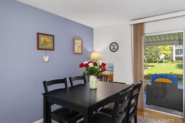 5472 Paseo Del Lago E Unit B, Laguna Woods, CA 92637 - dining room featuring light wood-style floors
