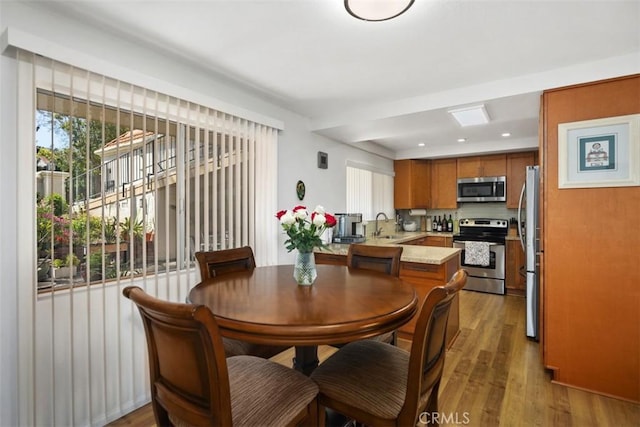 5472 Paseo Del Lago E Unit B, Laguna Woods, CA 92637 - dining area with light wood-type flooring and recessed lighting