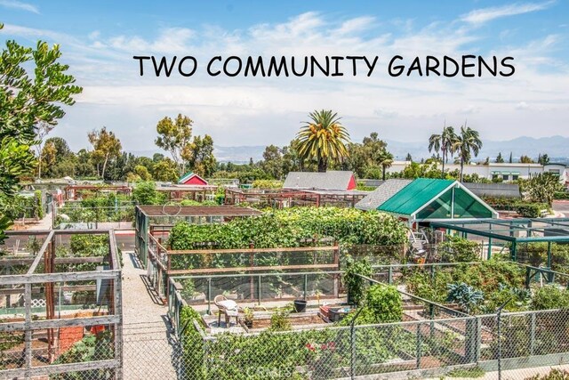 5472 Paseo Del Lago E Unit B, Laguna Woods, CA 92637 - view of home's community with a garden