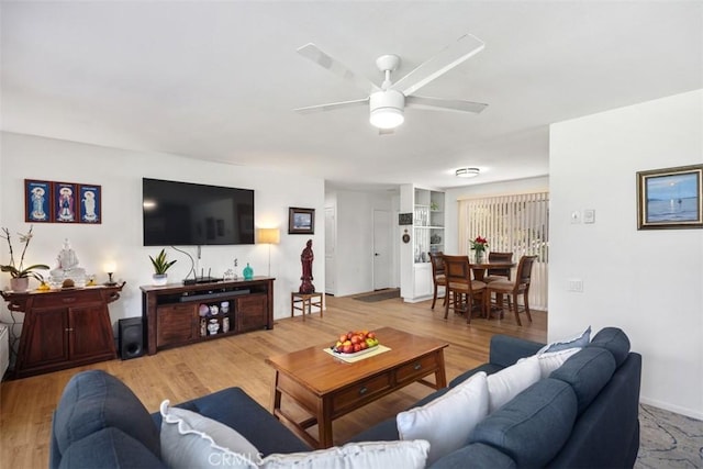 5472 Paseo Del Lago E Unit B, Laguna Woods, CA 92637 - living area featuring a ceiling fan and light wood finished floors