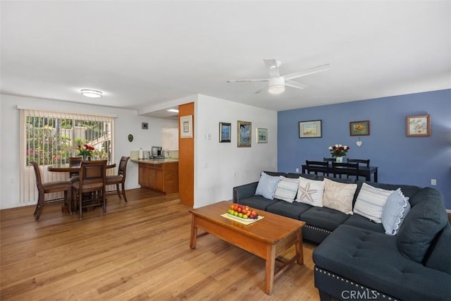 5472 Paseo Del Lago E Unit B, Laguna Woods, CA 92637 - living room with light wood finished floors and ceiling fan