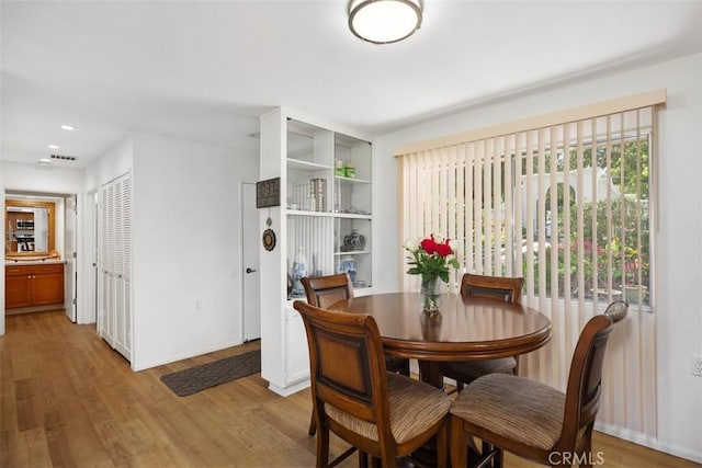 5472 Paseo Del Lago E Unit B, Laguna Woods, CA 92637 - dining room featuring light wood finished floors and baseboards