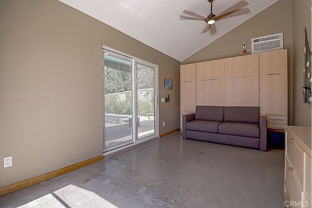 living room featuring baseboards, an AC wall unit, a ceiling fan, and vaulted ceiling